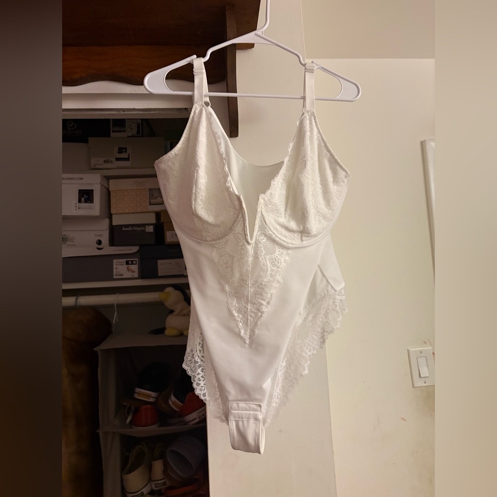 Elegant White Lace Bodysuit